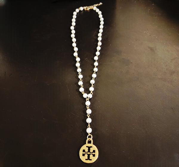 Tory Burch Dust Bag Charm Reimagined on White Beaded Adjustable Lariat Necklace